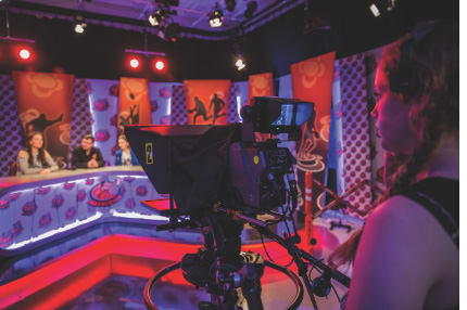 Campus group filming in tv studio