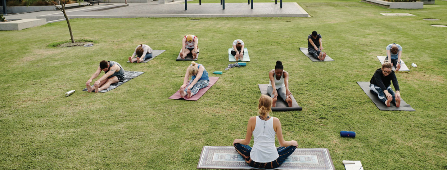 Group exercising doing yoga